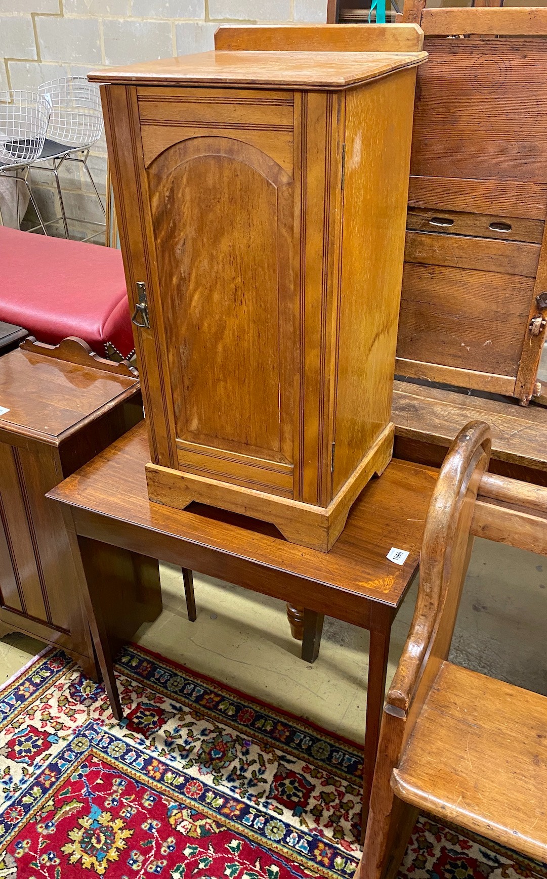 A Victorian inlaid mahogany occasional table, width 73cm and a late Victorian ash bedside cupboard (2)